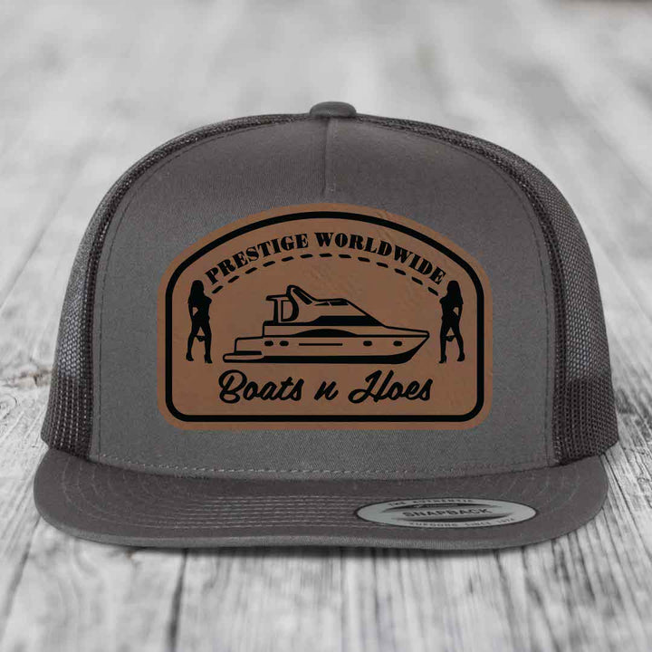 Prestige Worldwide, Boats and Hoes - Leather Patch Hat - Dark Brown to Black Patch - Yupoong 6006 Snapback Flatbill Hat