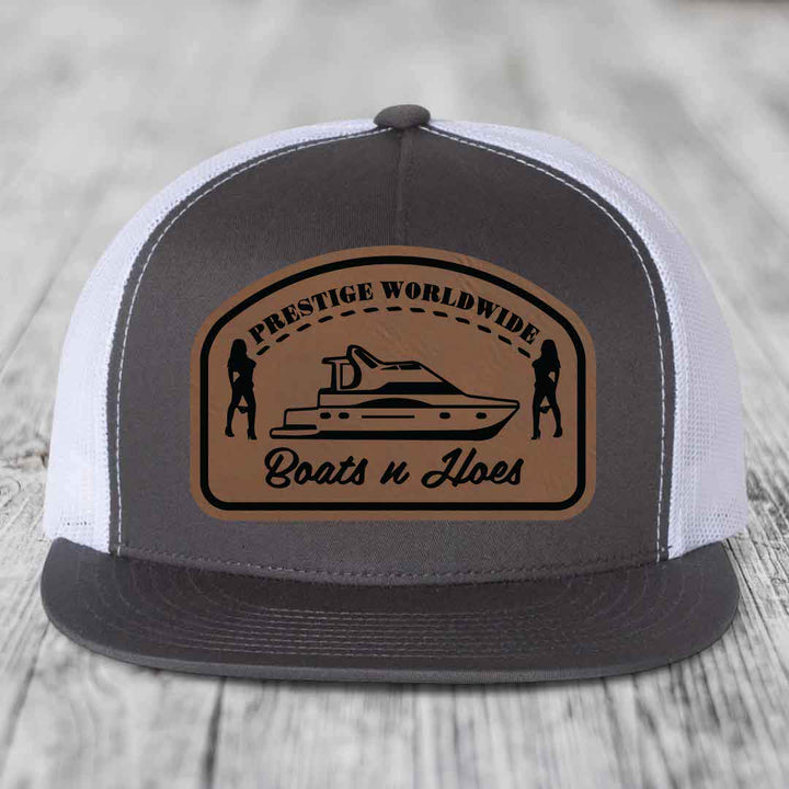 Prestige Worldwide, Boats and Hoes - Leather Patch Hat - Dark Brown to Black Patch - Yupoong 6006 Snapback Flatbill Hat