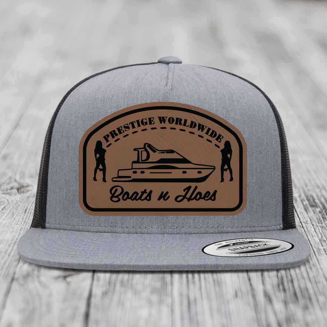 Prestige Worldwide, Boats and Hoes - Leather Patch Hat - Dark Brown to Black Patch - Yupoong 6006 Snapback Flatbill Hat