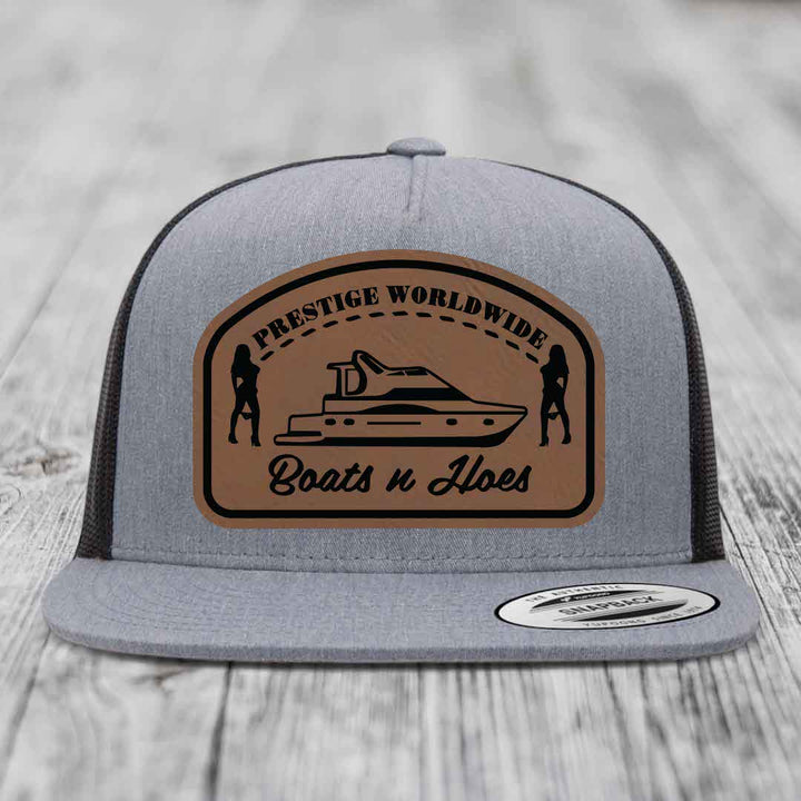Prestige Worldwide, Boats and Hoes - Leather Patch Hat - Dark Brown to Black Patch - Yupoong 6006 Snapback Flatbill Hat