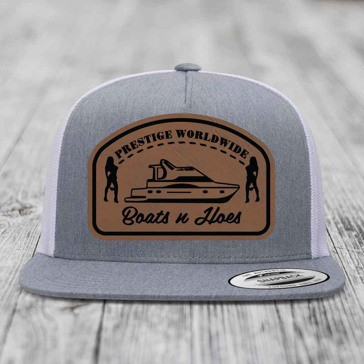Prestige Worldwide, Boats and Hoes - Leather Patch Hat - Dark Brown to Black Patch - Yupoong 6006 Snapback Flatbill Hat