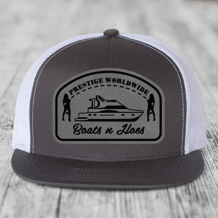 Prestige Worldwide, Boats and Hoes - Leather Patch Hat - Grey to Black Patch - Yupoong 6006 Snapback Flatbill Hat