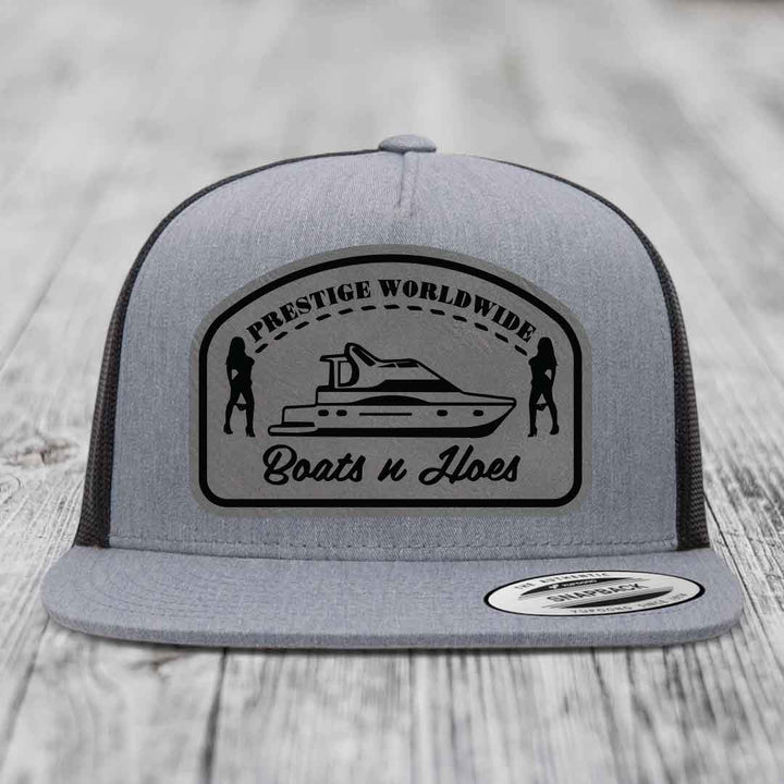 Prestige Worldwide, Boats and Hoes - Leather Patch Hat - Grey to Black Patch - Yupoong 6006 Snapback Flatbill Hat