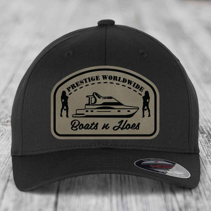 Prestige Worldwide, Boats and Hoes - Leather Patch Hat - Light Brown to Black Patch - Flexfit 6277 Fitted Hat