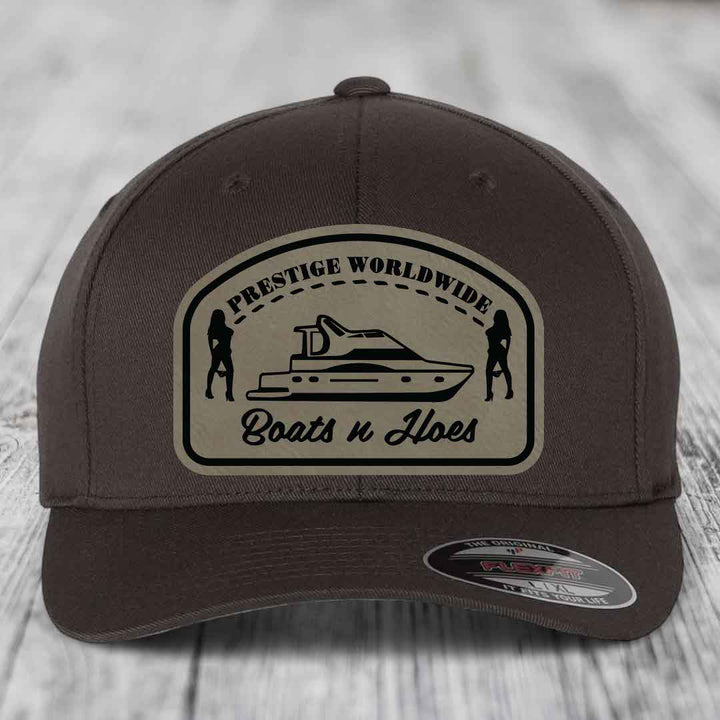 Prestige Worldwide, Boats and Hoes - Leather Patch Hat - Light Brown to Black Patch - Flexfit 6277 Fitted Hat