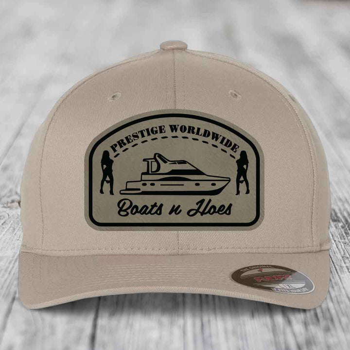 Prestige Worldwide, Boats and Hoes - Leather Patch Hat - Light Brown to Black Patch - Flexfit 6277 Fitted Hat