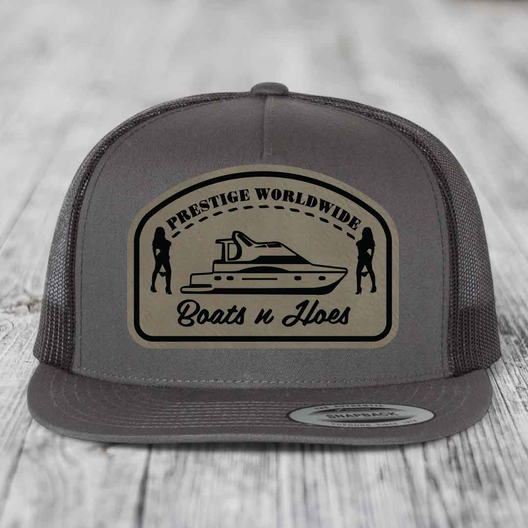Prestige Worldwide, Boats and Hoes - Leather Patch Hat - Light Brown to Black Patch - Yupoong 6006 Snapback Flatbill Hat