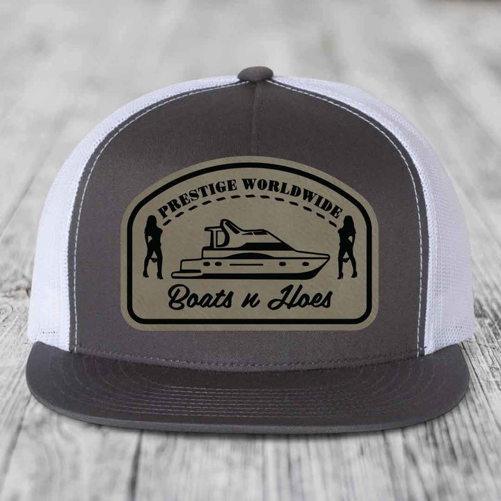 Prestige Worldwide, Boats and Hoes - Leather Patch Hat - Light Brown to Black Patch - Yupoong 6006 Snapback Flatbill Hat