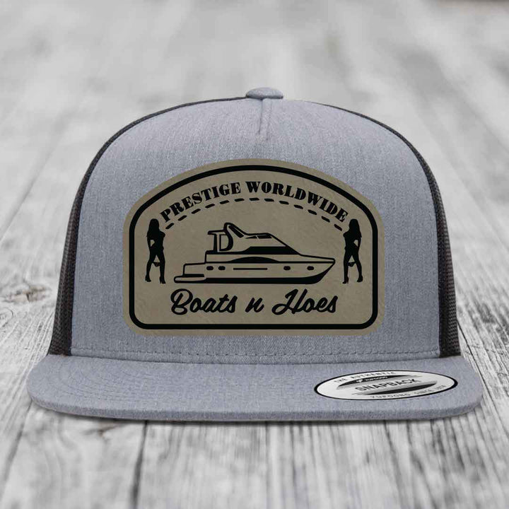 Prestige Worldwide, Boats and Hoes - Leather Patch Hat - Light Brown to Black Patch - Yupoong 6006 Snapback Flatbill Hat