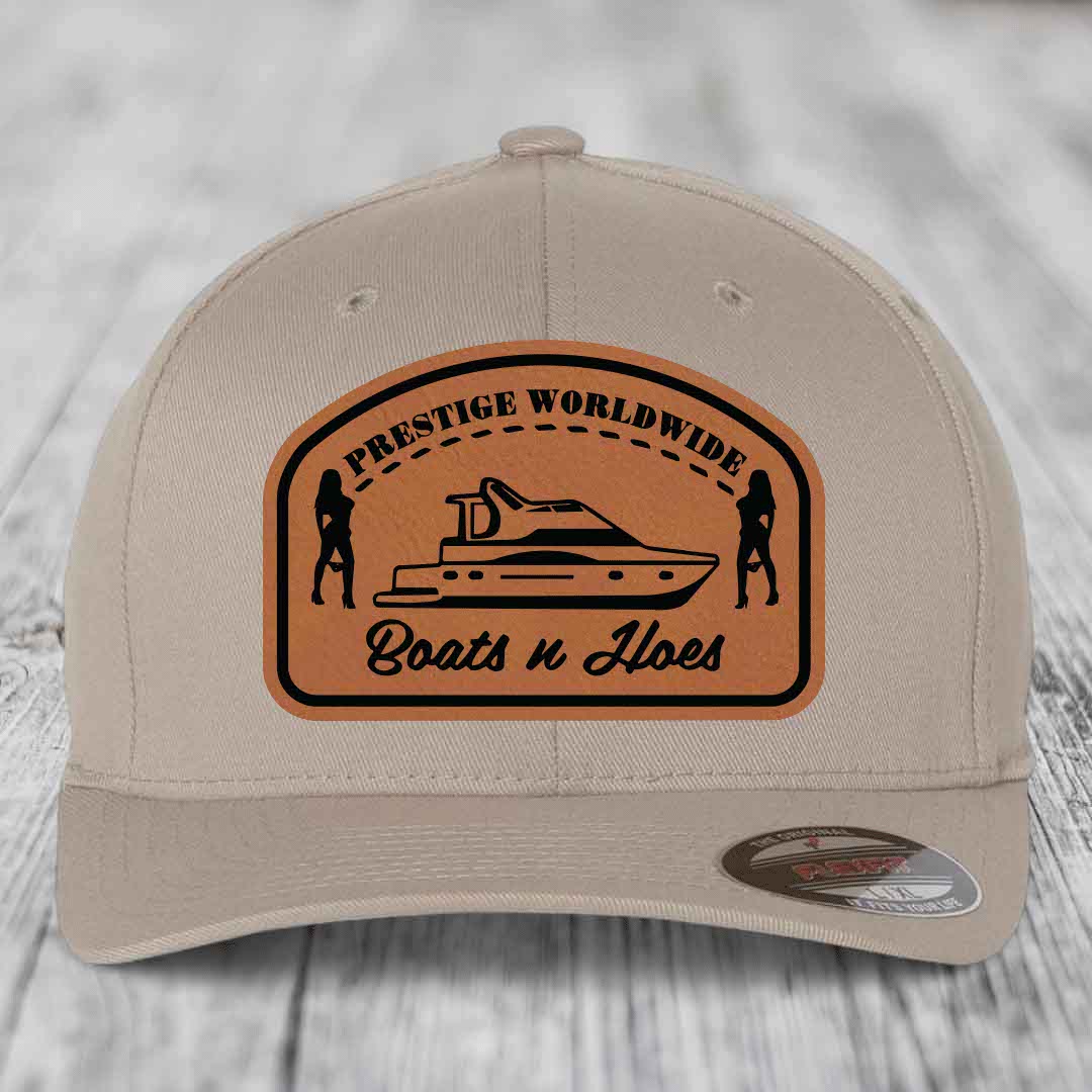 Prestige Worldwide, Boats and Hoes - Leather Patch Hat - Rawhide to Black Patch - Flexfit 6277 Fitted Hat