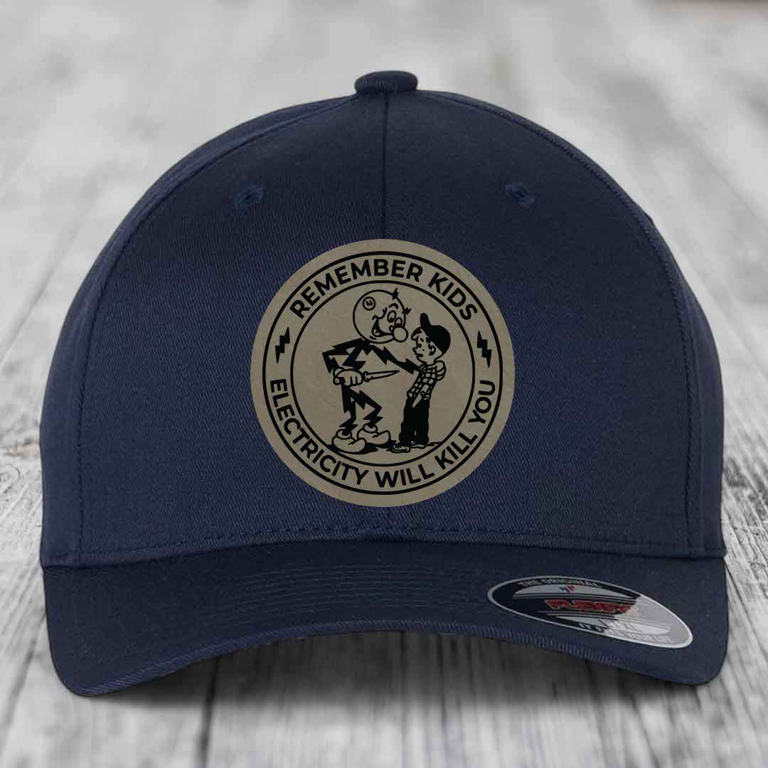 Dark blue baseball cap with circular beige patch reading &