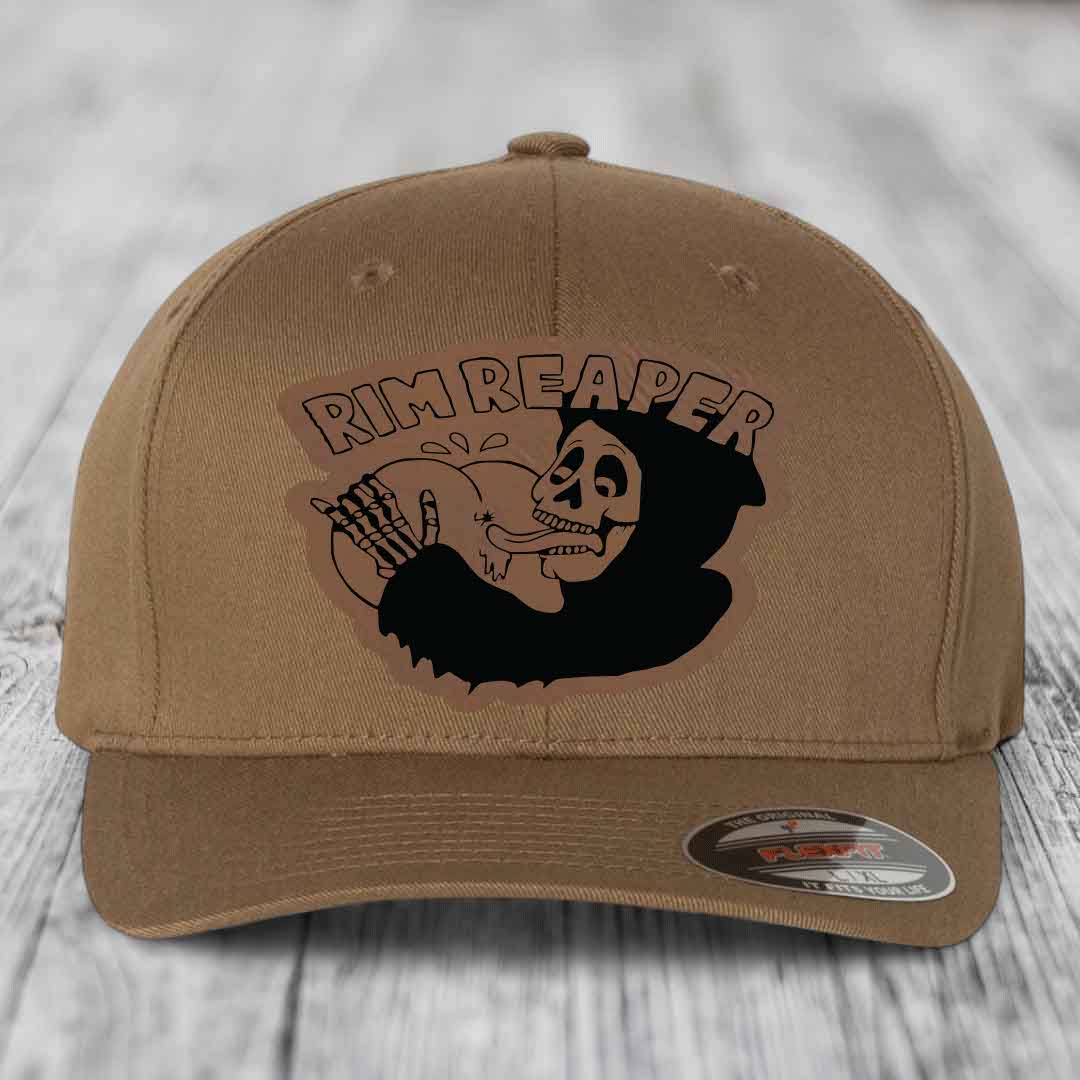 Tan baseball cap with black &