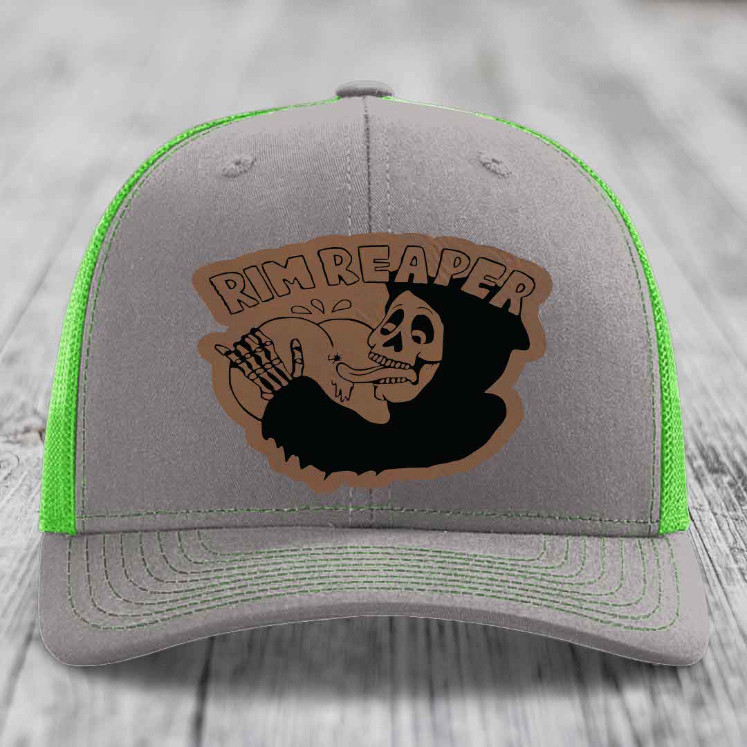 Grey trucker hat with neon green mesh and stitching, featuring a brown &