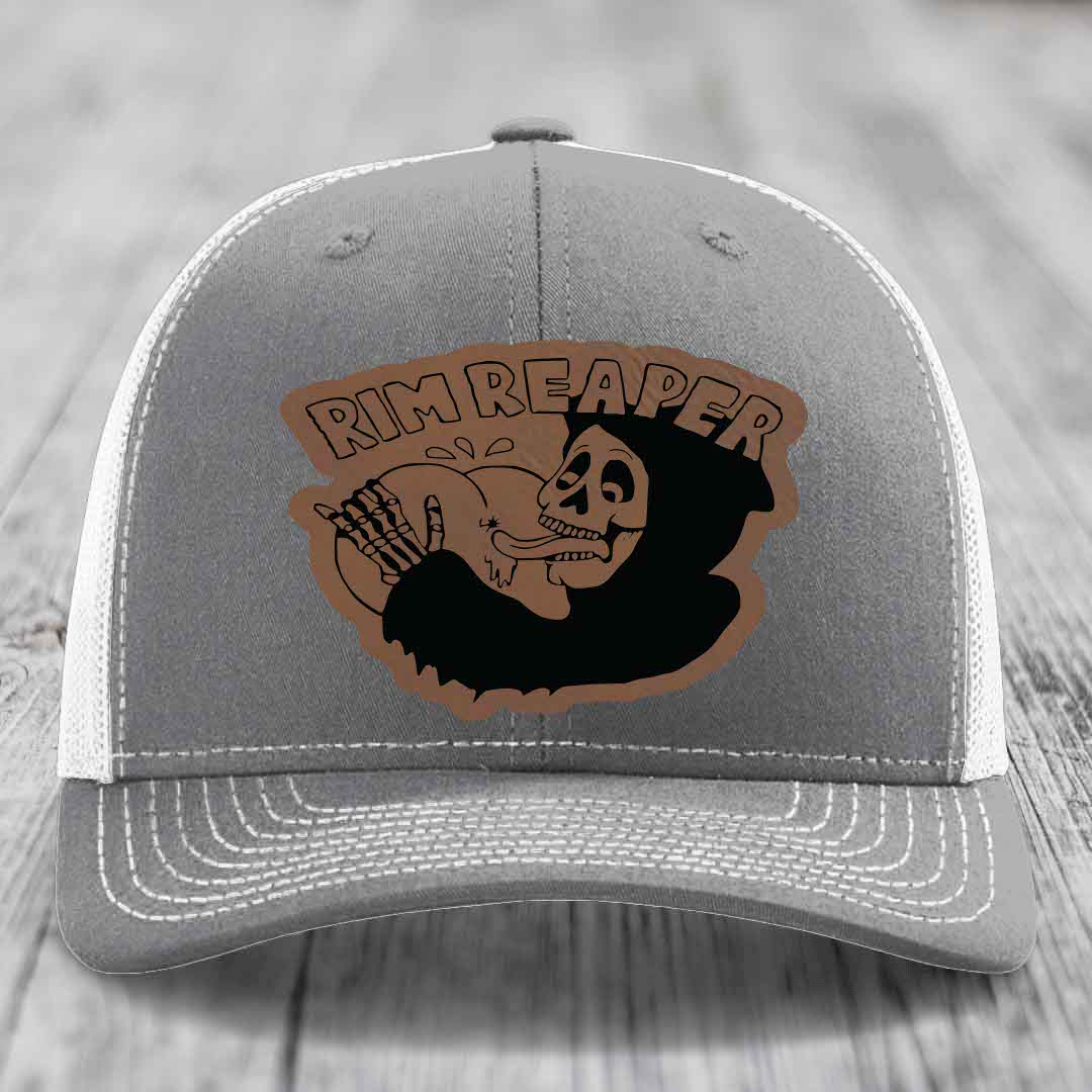 Grey trucker hat with white mesh back and embroidered &