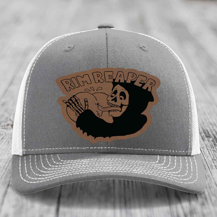 Grey trucker hat with white mesh back and embroidered &