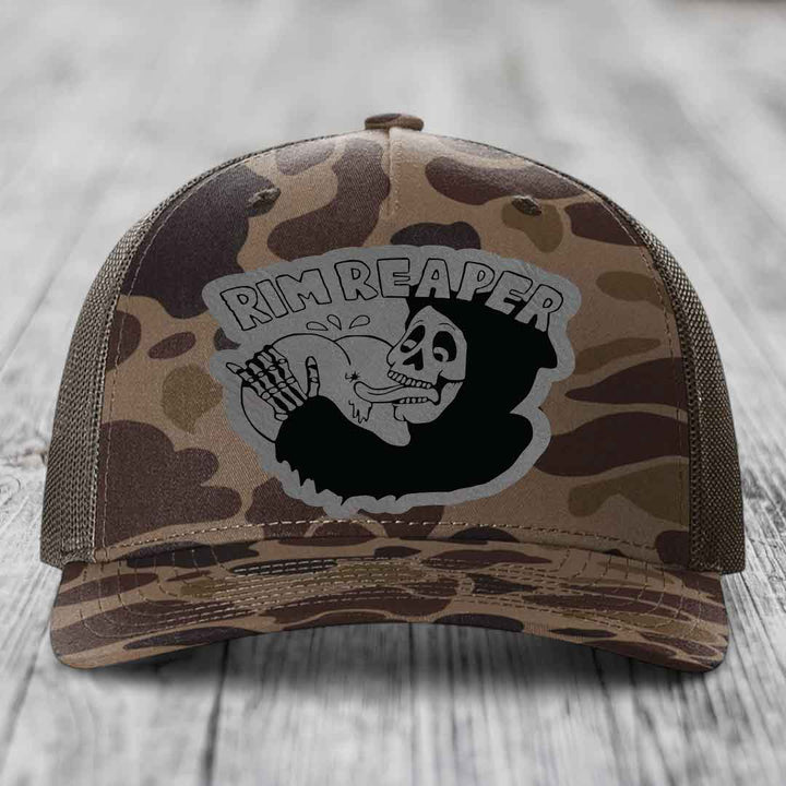 Camouflage trucker hat with &