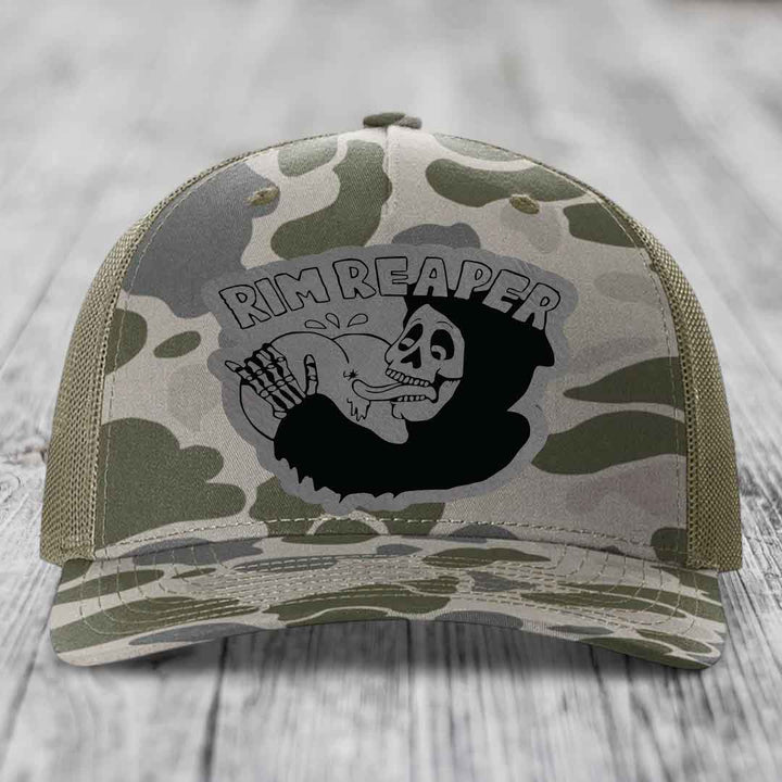 Camouflage trucker hat with black &