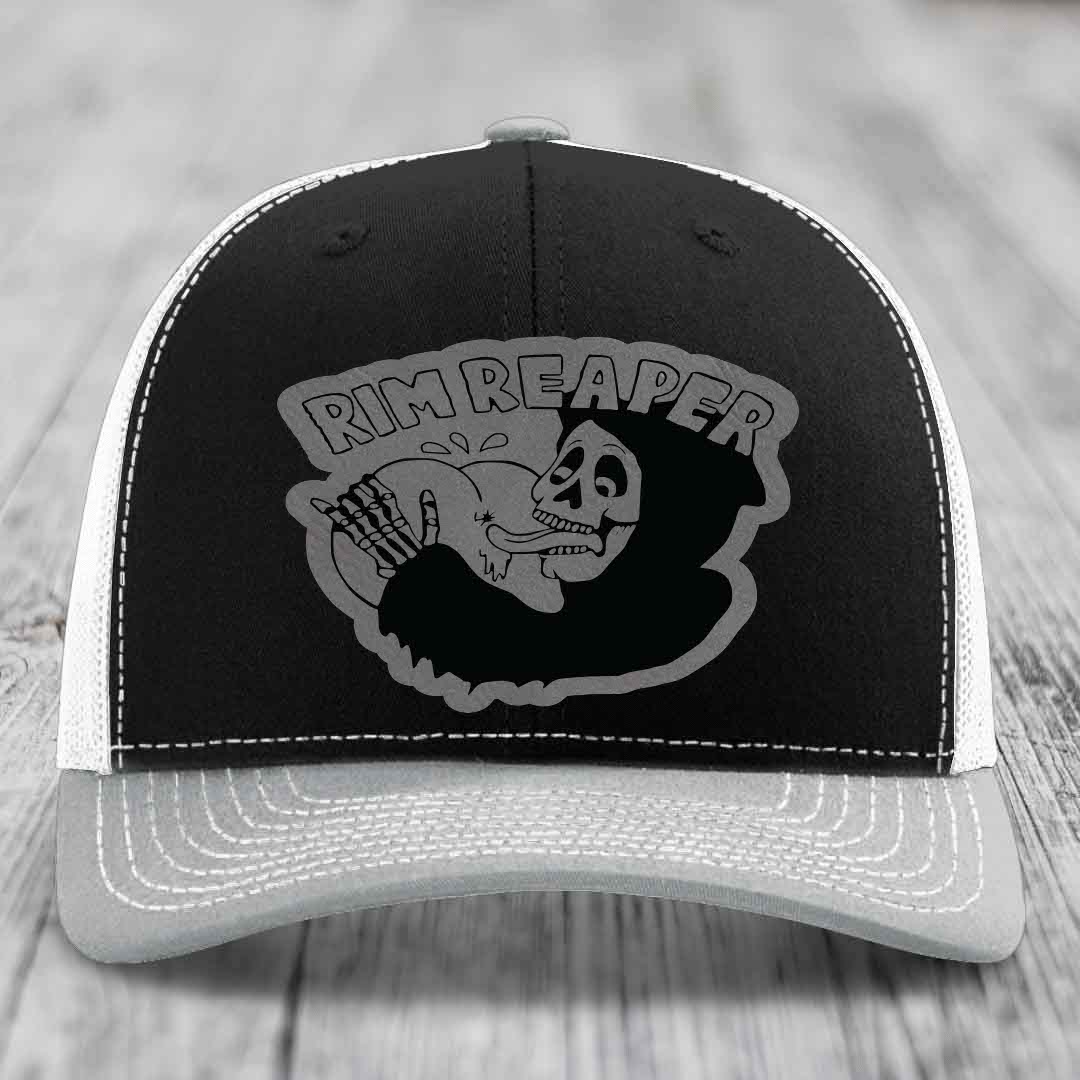 Black and grey trucker hat with &