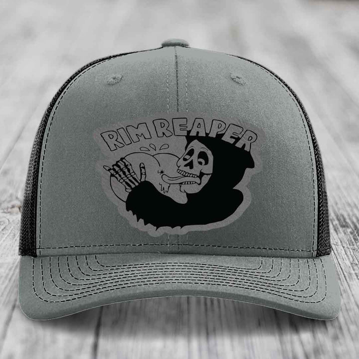 Grey trucker hat with black embroidered &
