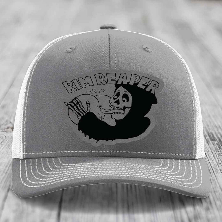 Grey trucker hat with black embroidered &