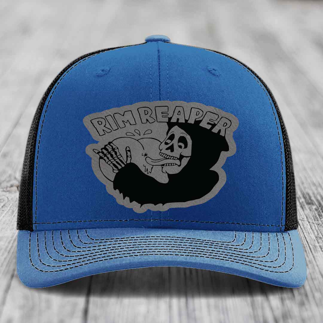 Blue trucker hat with black mesh back and gray &