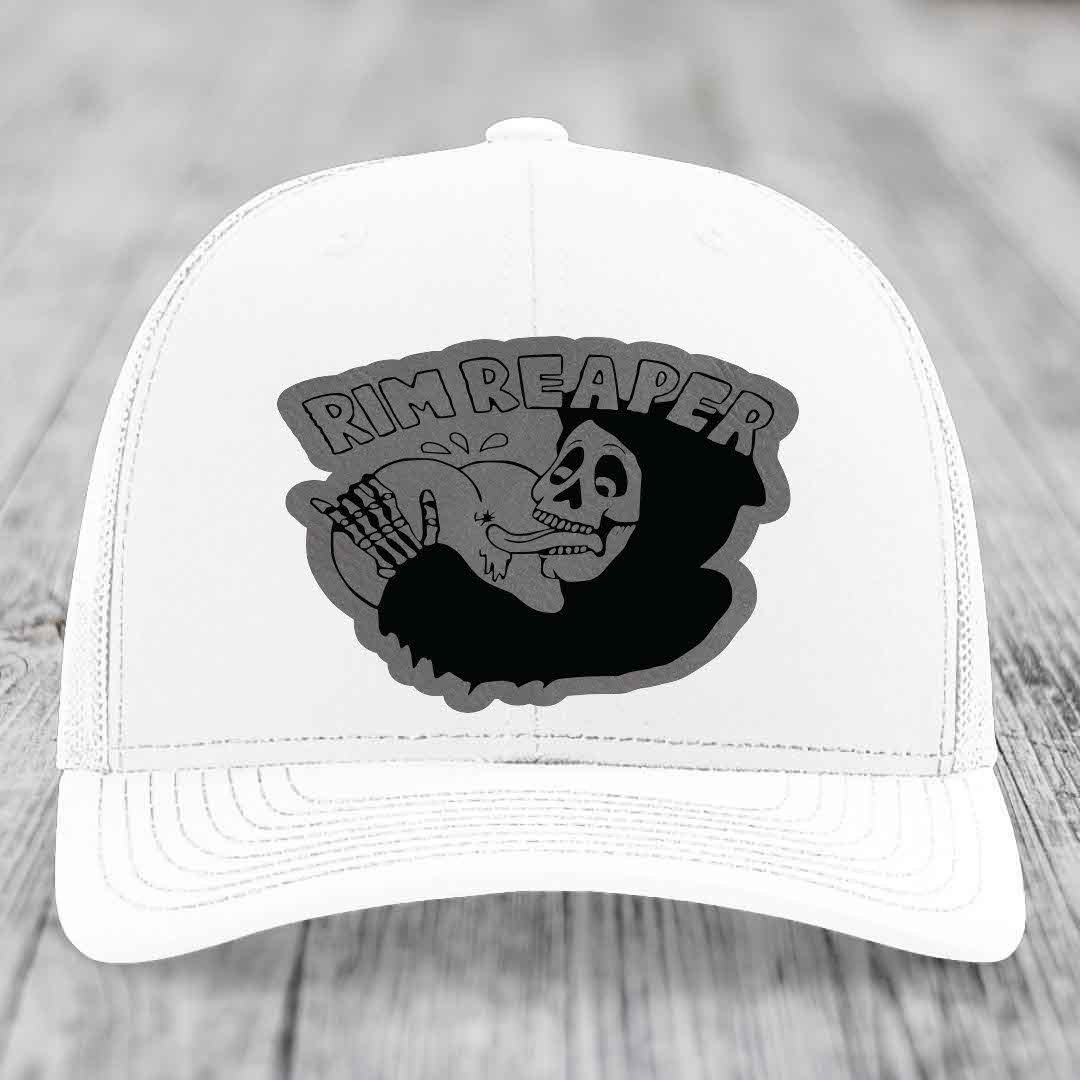White trucker hat with black and grey &