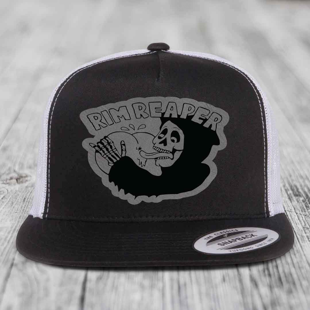 Black and white trucker hat with &