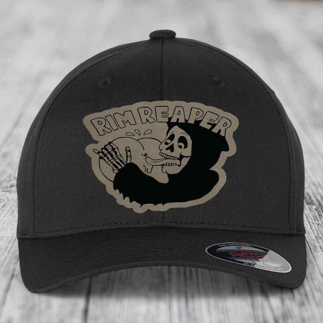 Black baseball cap with a beige and black &