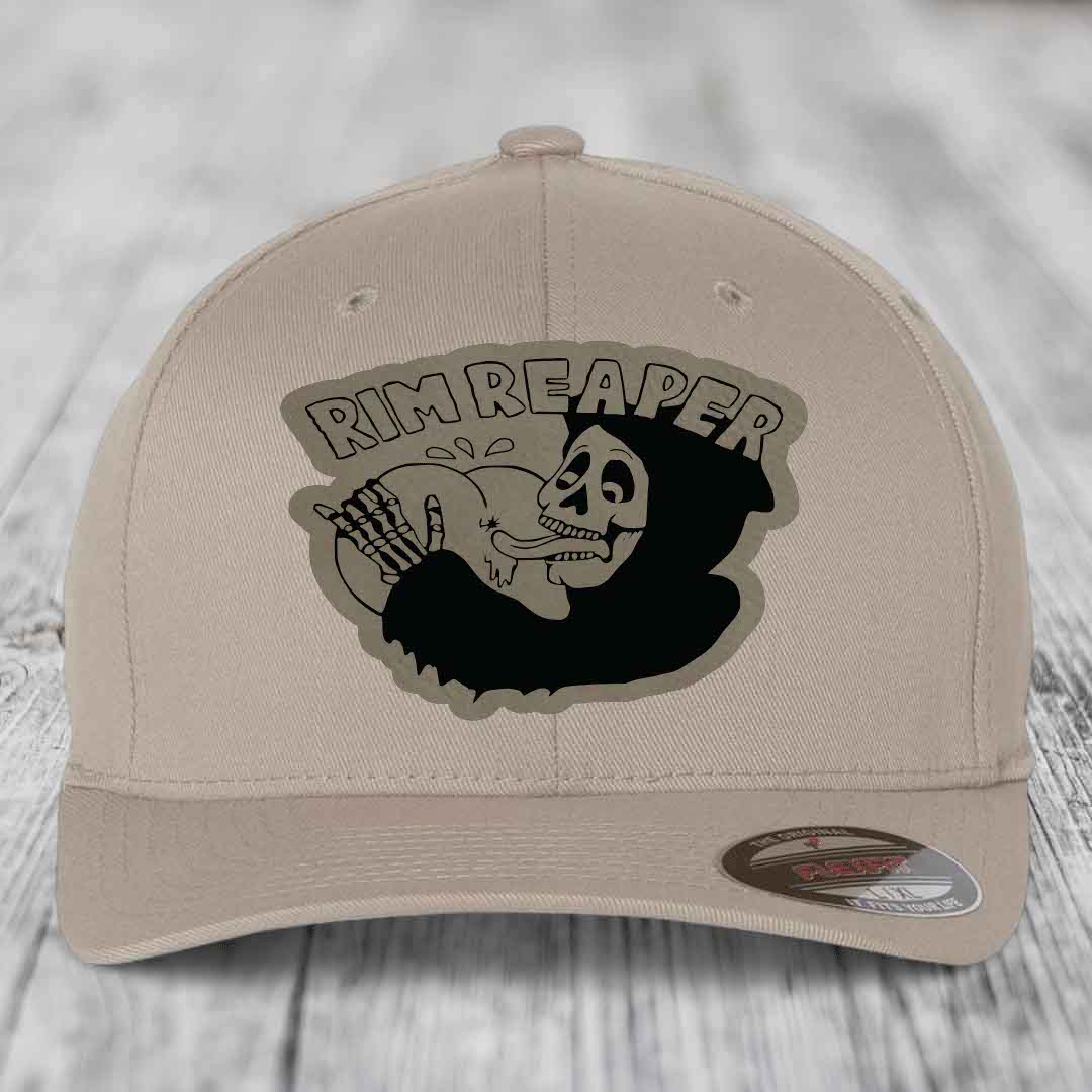 Beige baseball cap with black &