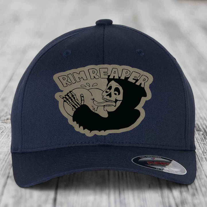 Dark blue baseball cap with a beige and black &