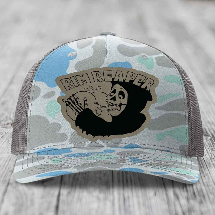 Camouflage trucker hat with &