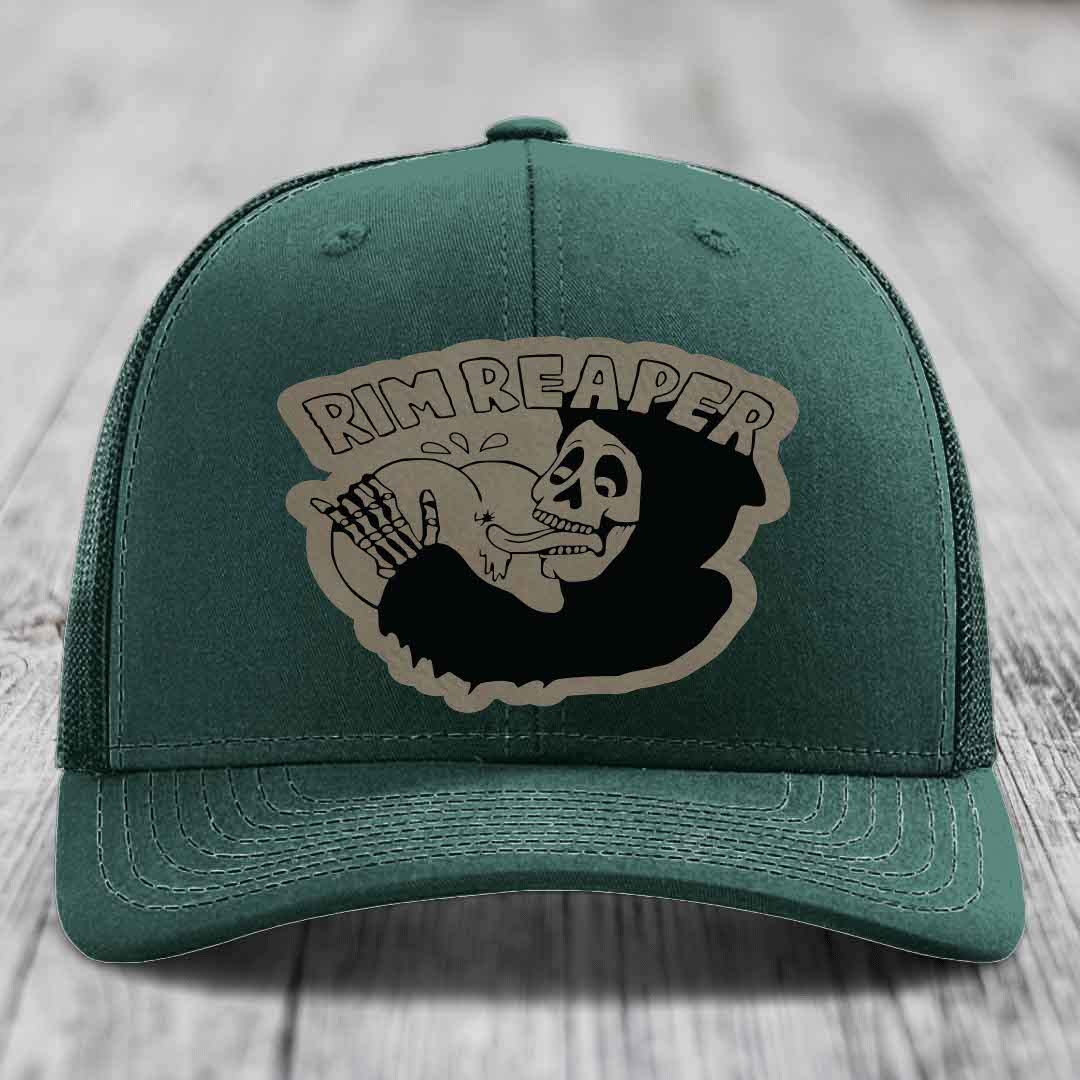 Green trucker hat with a beige and black &