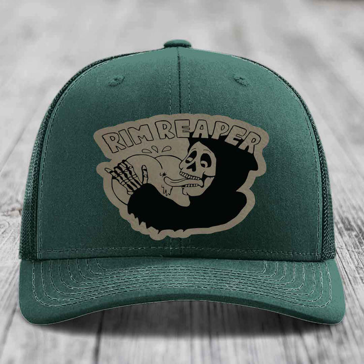 Green trucker hat with a beige and black &