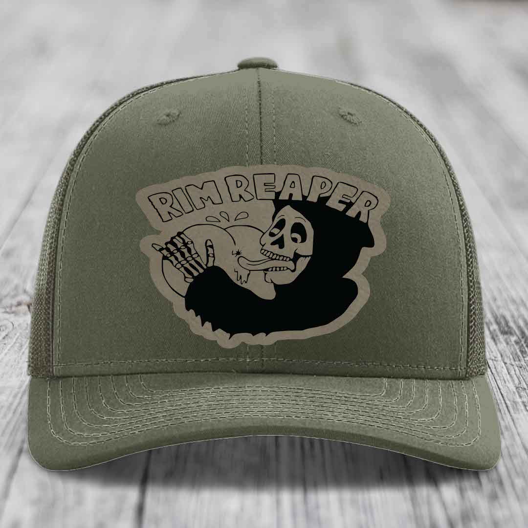 Olive green trucker hat with a black and beige &