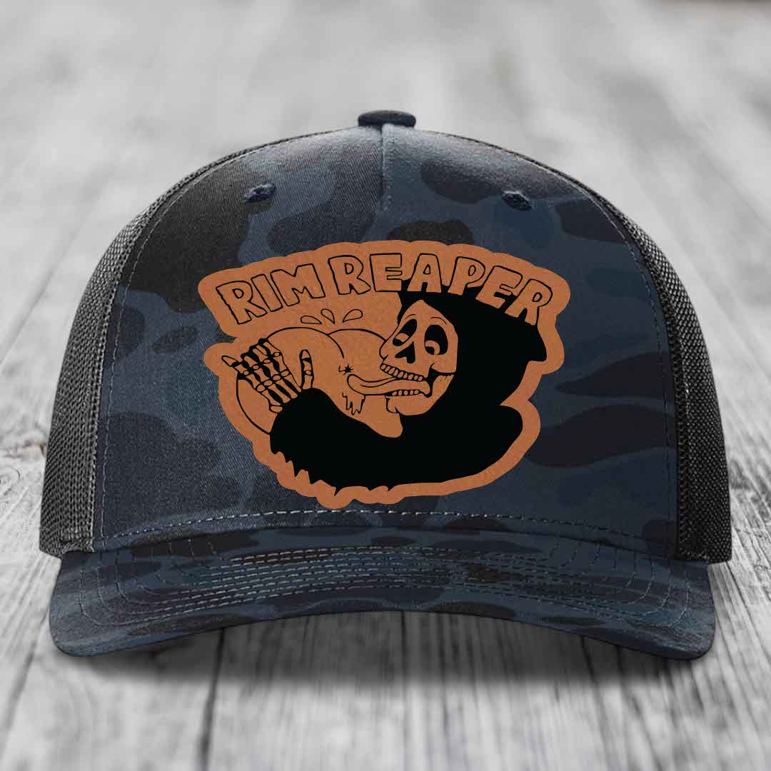 Camouflage trucker hat with orange &