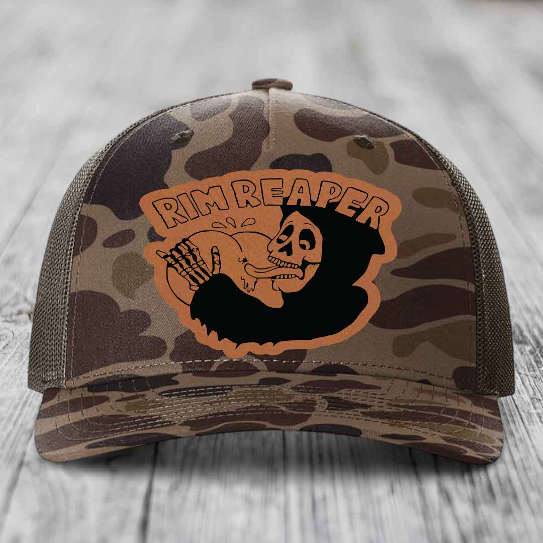 Camouflage trucker hat with orange &