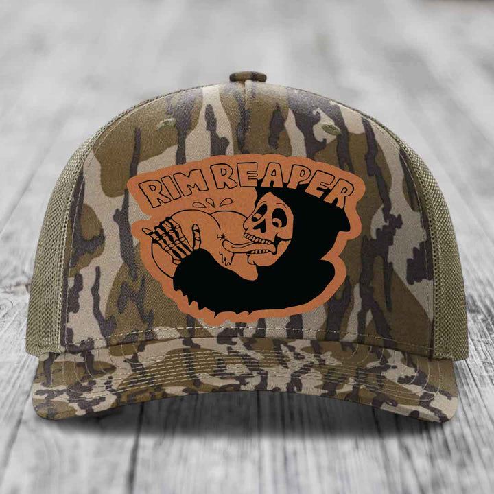 Camouflage trucker hat with orange &