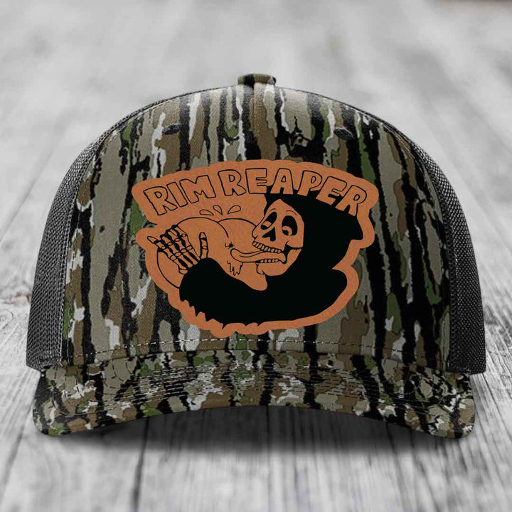 Camouflage trucker hat with orange &