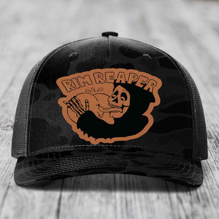 Black trucker hat with orange &