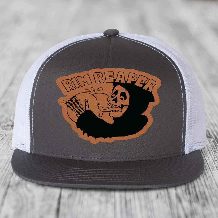 Grey front panel trucker hat with orange and black &