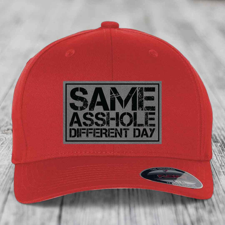 Red baseball cap with &