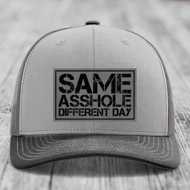 Grey trucker hat with black &
