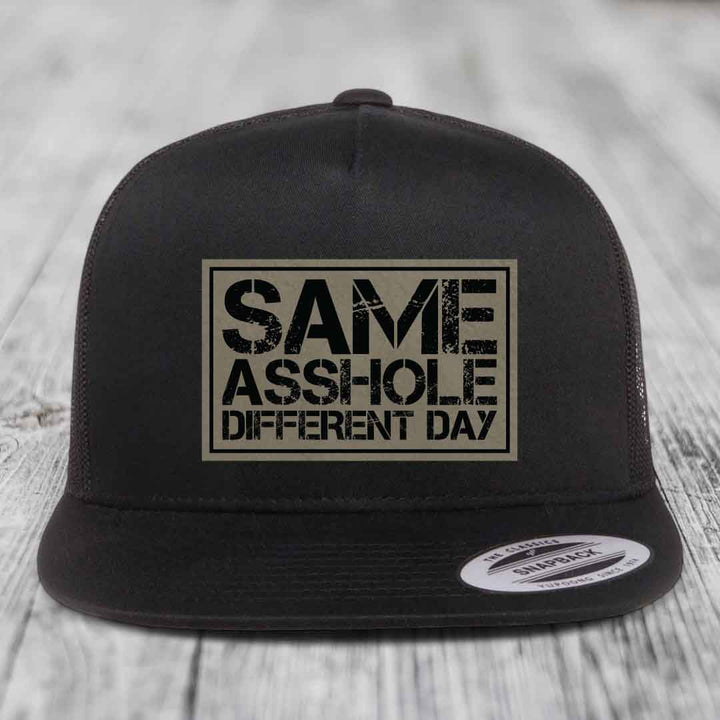Same Asshole, Different Day - Leather Patch Hat - Light Brown to Black Patch - Yupoong 6006 Snapback Flatbill Hat