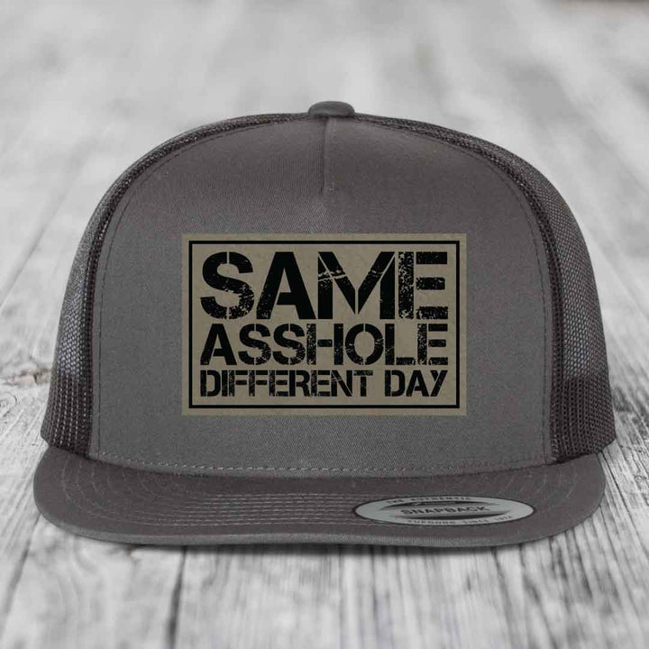 Same Asshole, Different Day - Leather Patch Hat - Light Brown to Black Patch - Yupoong 6006 Snapback Flatbill Hat
