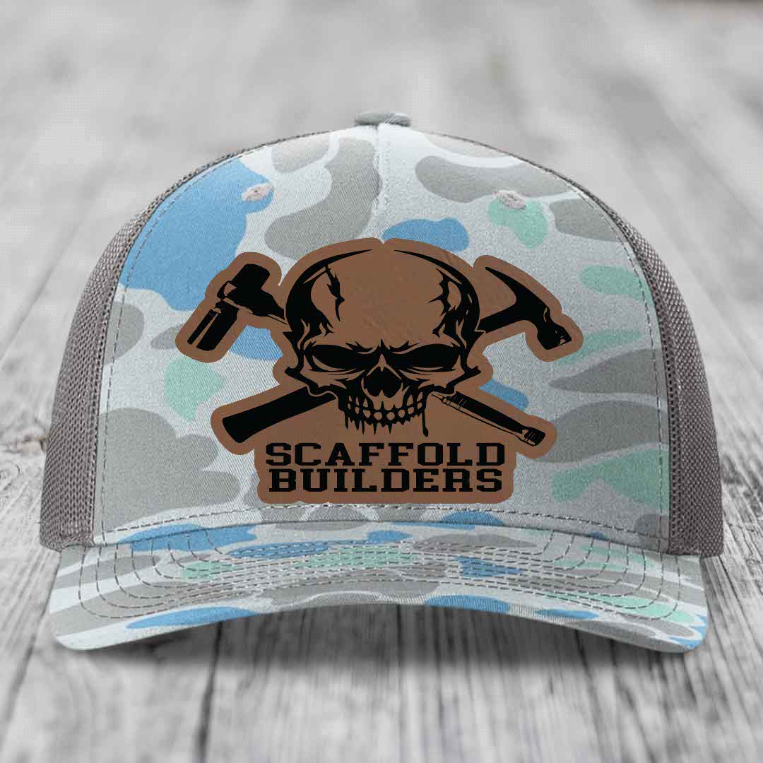 Camouflage trucker hat with skull and crossed hammers patch reading &