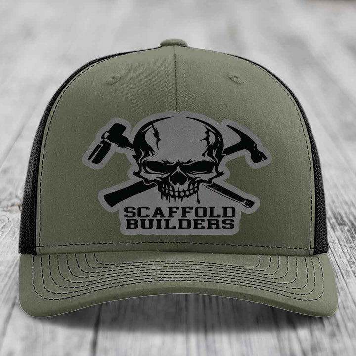 Olive green trucker hat with black mesh back, featuring a skull and crossed hammers patch that reads &