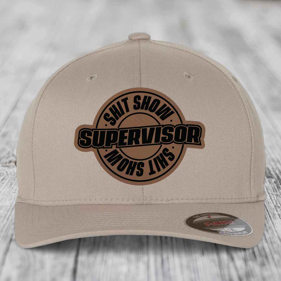 Shit Show Supervisor - Leather Patch Hat - Dark Brown to Black Patch - Flexfit 6277 Fitted Hat