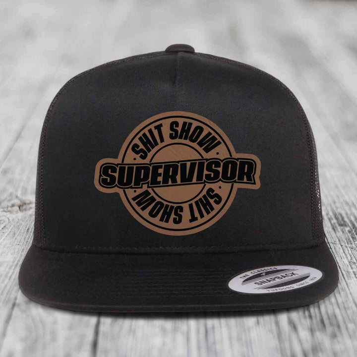 Shit Show Supervisor - Leather Patch Hat - Dark Brown to Black Patch - Yupoong 6006 Snapback Flatbill Hat