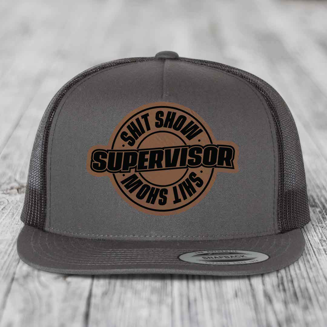 Shit Show Supervisor - Leather Patch Hat - Dark Brown to Black Patch - Yupoong 6006 Snapback Flatbill Hat