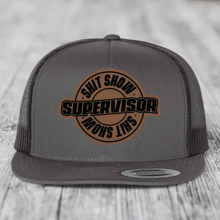 Shit Show Supervisor - Leather Patch Hat - Dark Brown to Black Patch - Yupoong 6006 Snapback Flatbill Hat